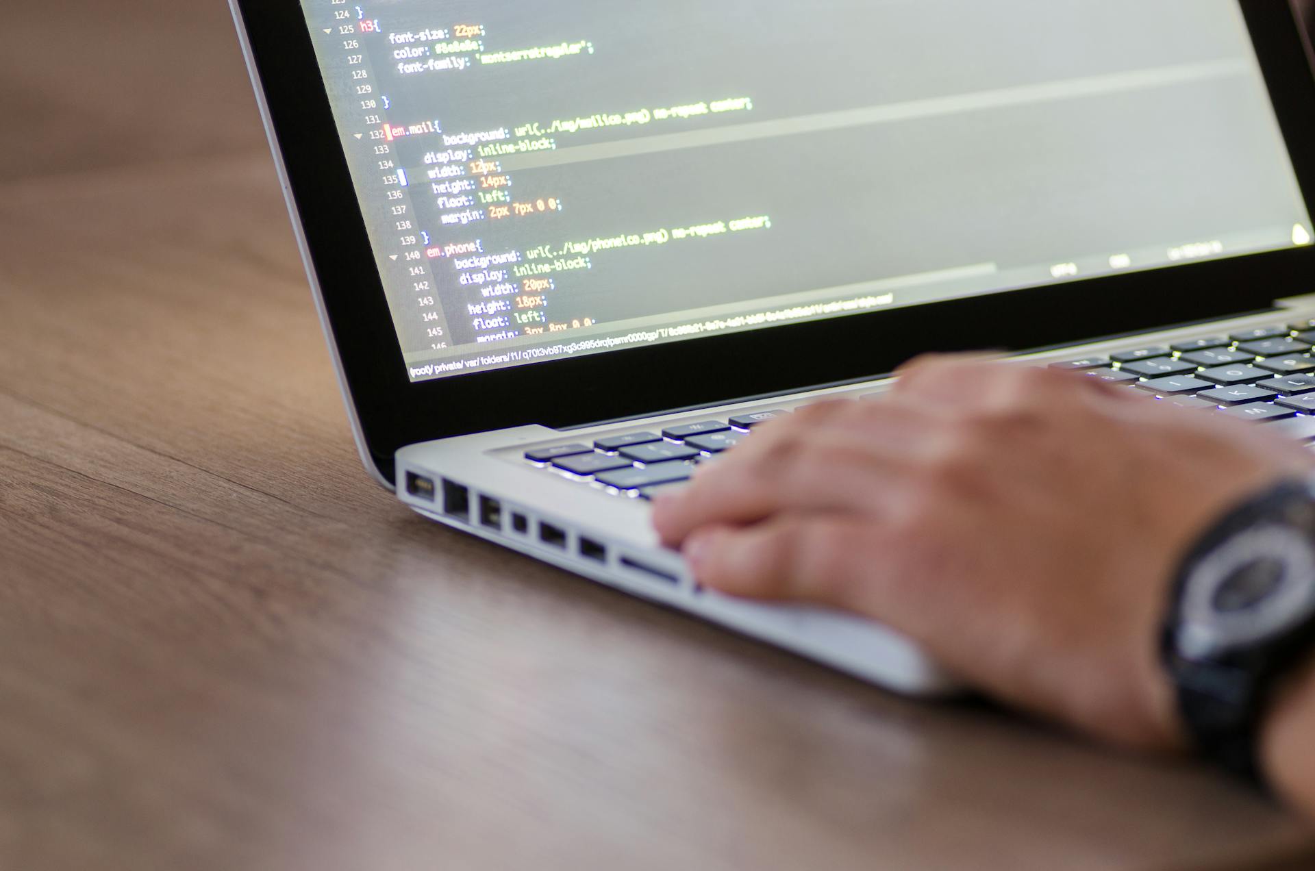 Multi-monitor code editor and terminal, representing Claude Code and Cursor as two AI programming environments